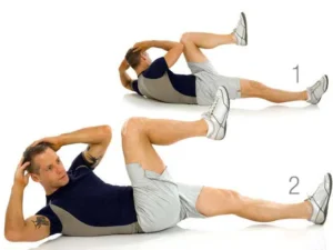 آموزش حرکت کرانچ دوچرخه برای تقویت عضلات شکم به عنوان بخشی از برنامه ورزش در خانه